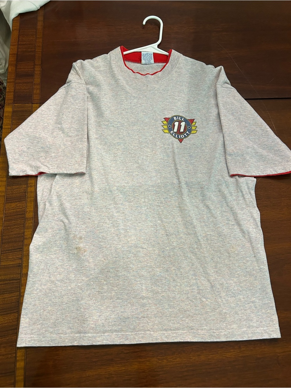 Light Gray Men’s Short Sleeve Tee with Red Trim and Chest Emblem